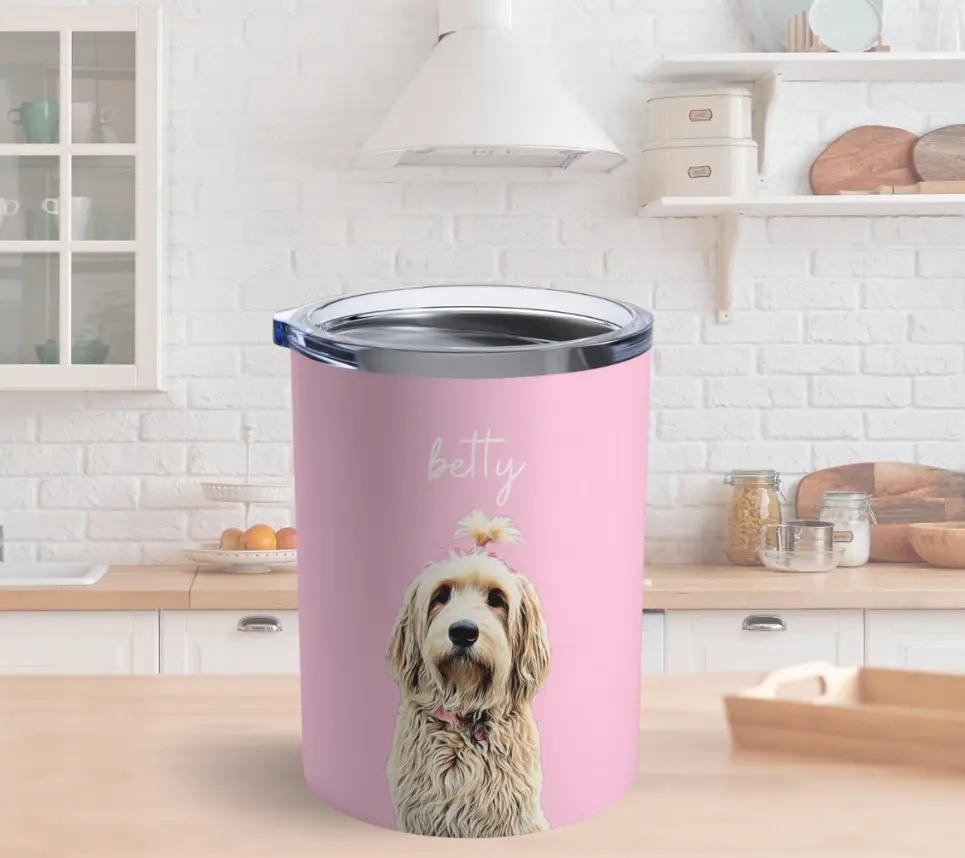 Custom pink pet tumbler with golden retriever 'Betty' portrait, perfect for pet lovers.