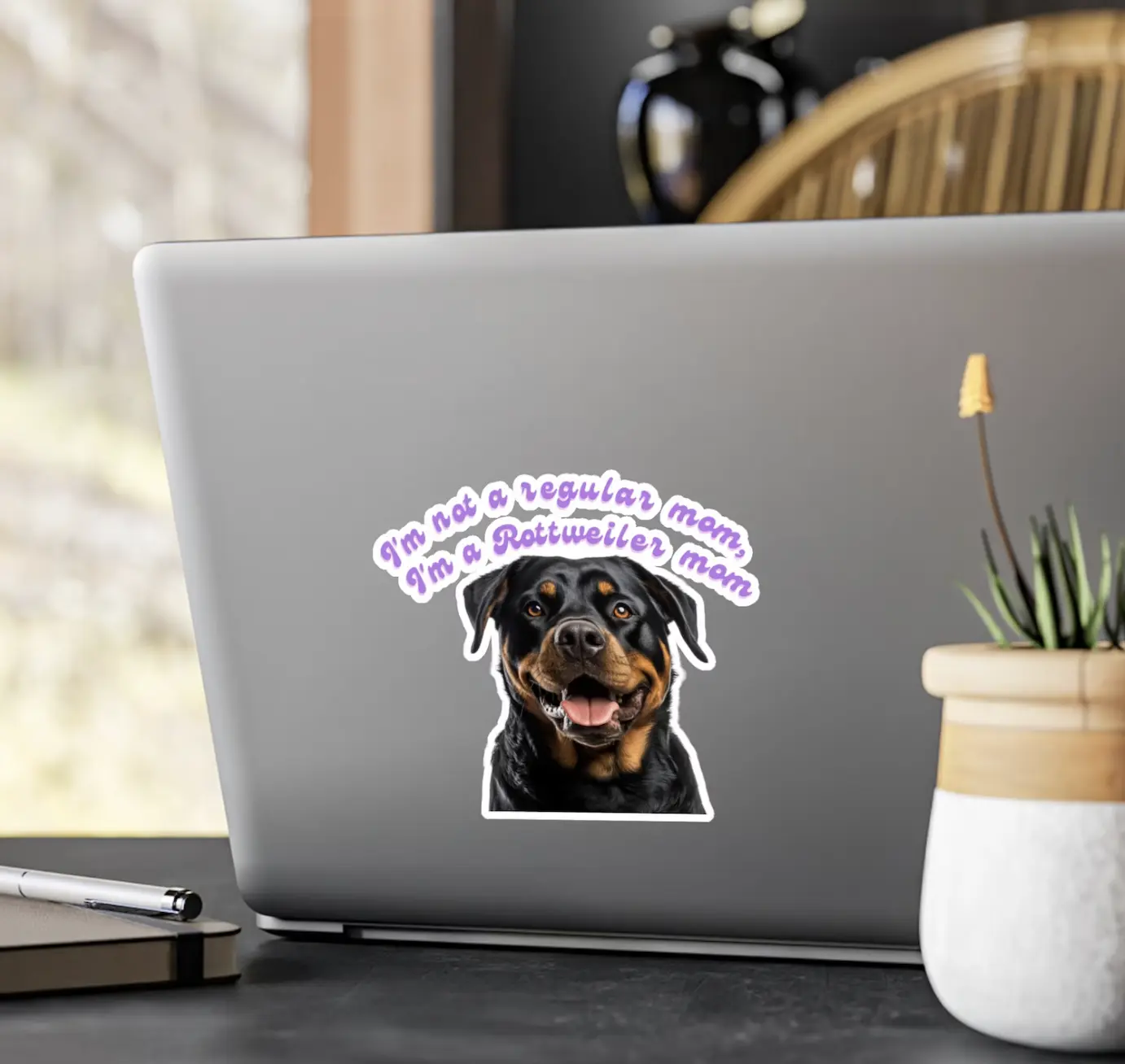 Custom 'I'm a Rottweiler mom' laptop sticker showcasing a smiling Rottweiler, perfect for dog parents.