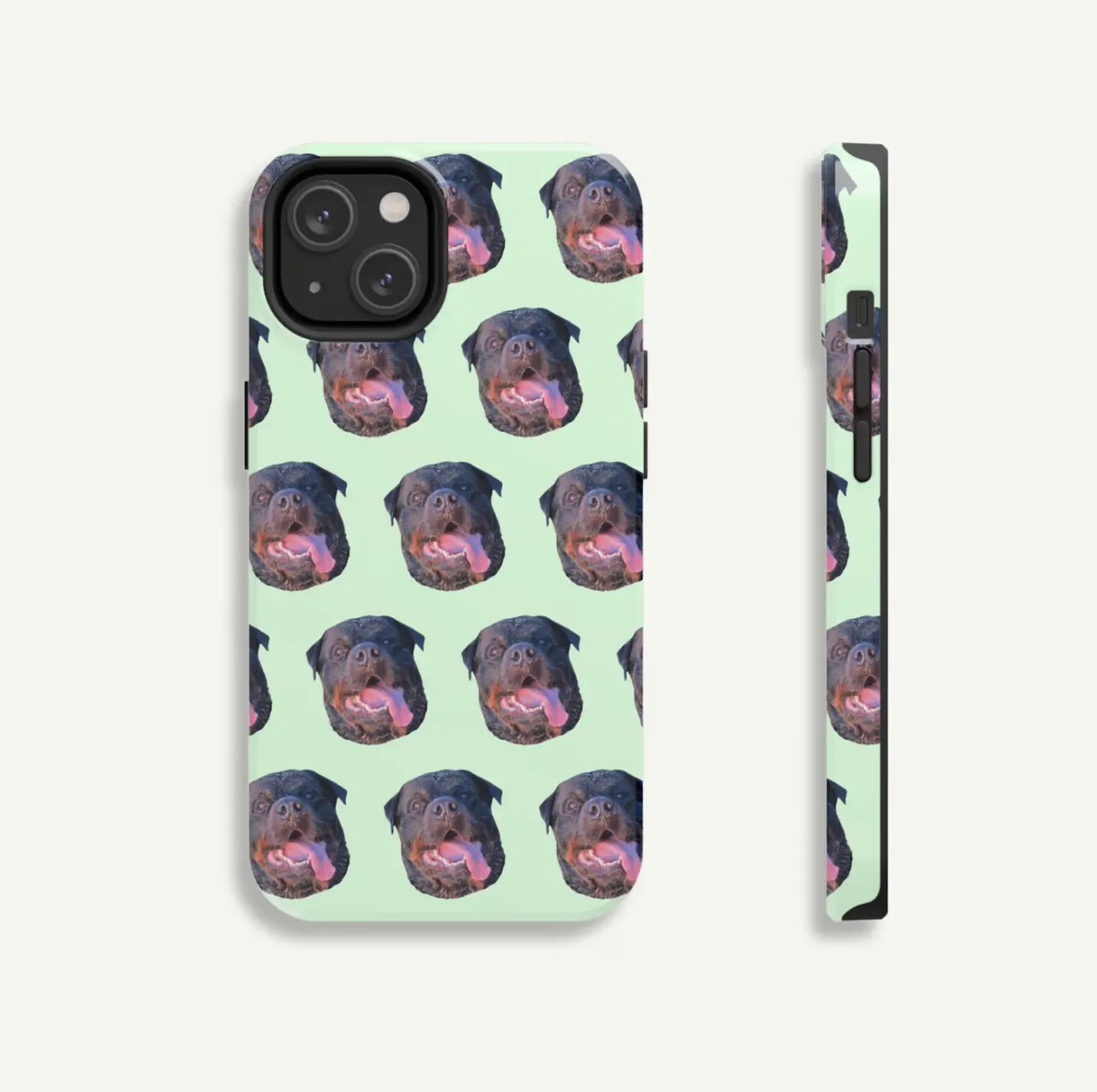 Side view of a phone with a custom case featuring a Rottweiler pattern on a mint background