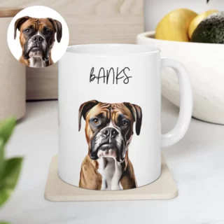 Custom white mug with a hand-painted illustration of a Boxer dog named Banks on a kitchen counter